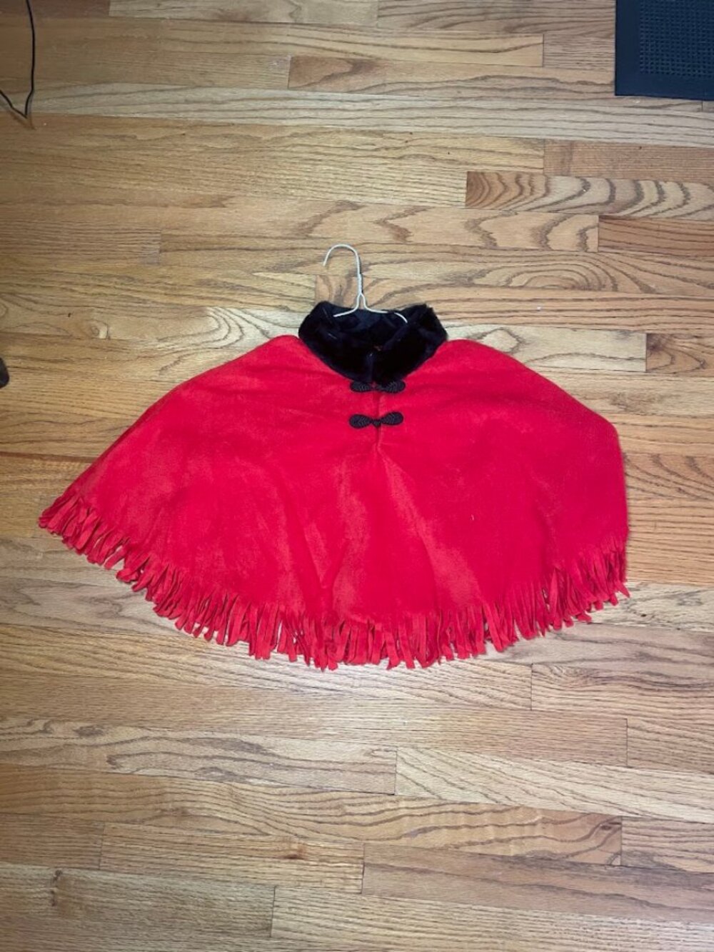 Majestic red cape/poncho with black collar